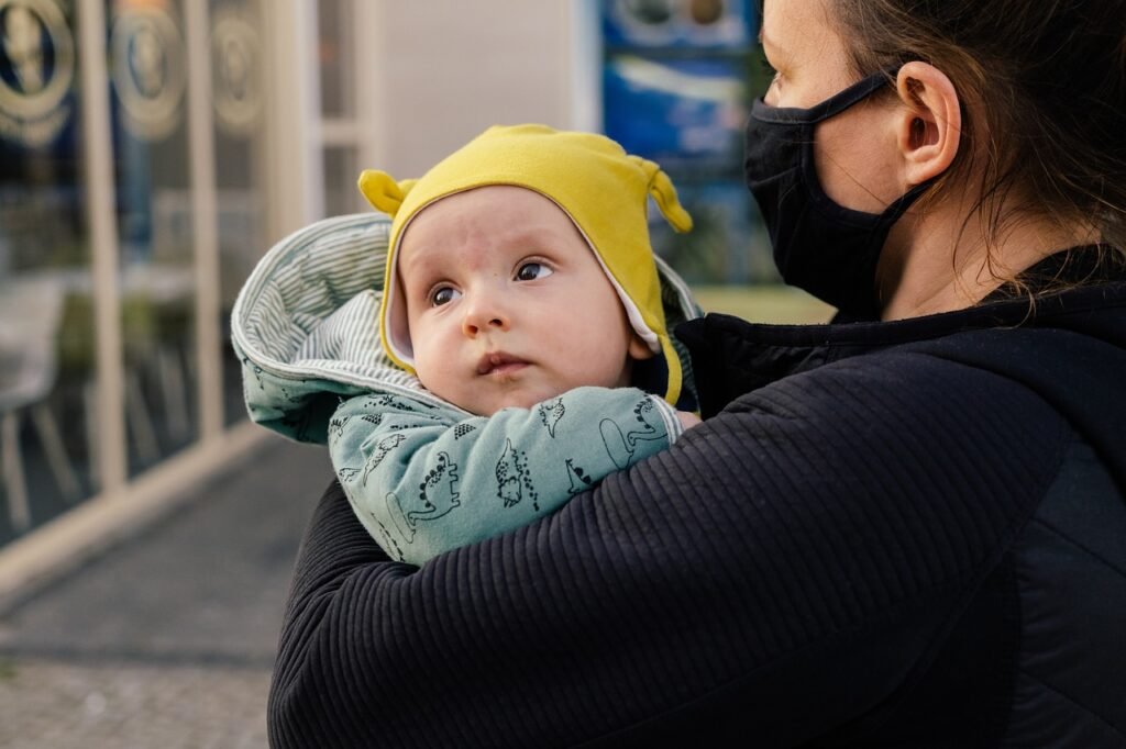 a mother holding a Child 