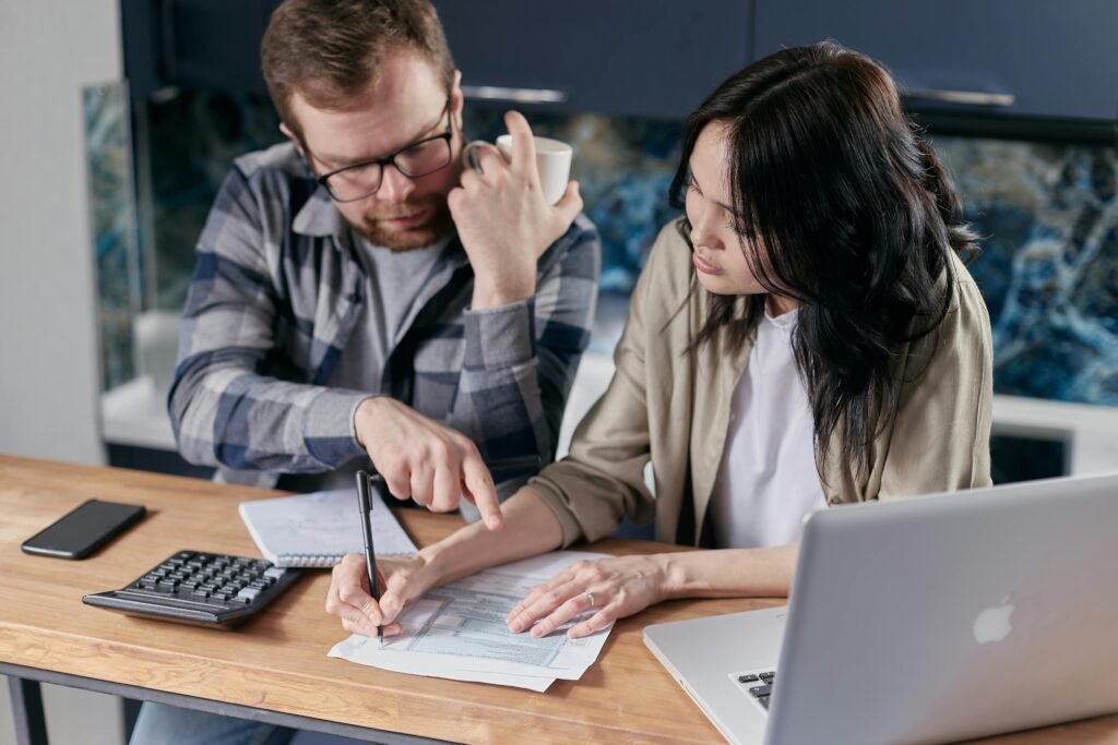 a couple are solving financial problem budgeting tips