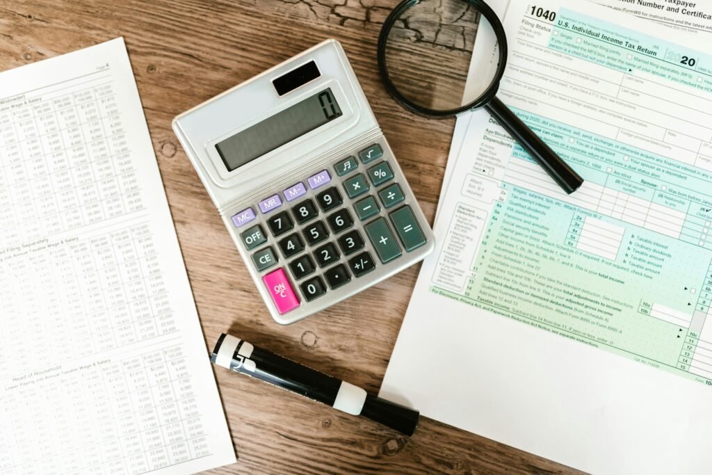 calculator and forms on the desk