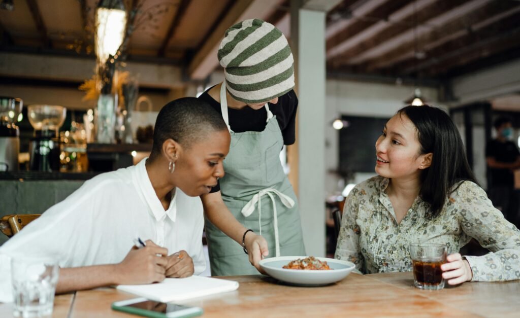 a chef is discussing with customer