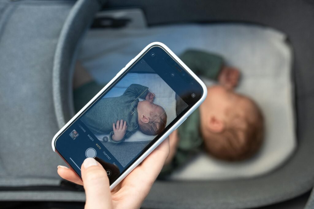 a snappin pictures of a baby