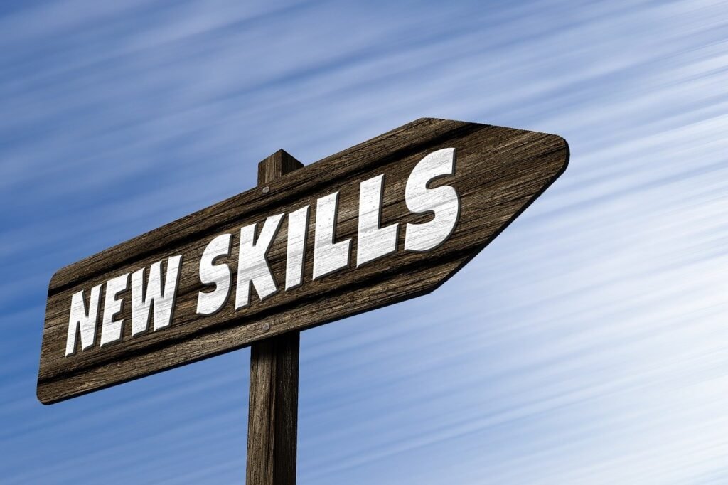 A wooden sign displaying the phrase "New Skills," emphasizing personal growth and learning opportunities.